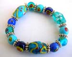 Fashion stretchy green blue bracelet with multi color hand-painted Chinese lampwork glass bead and flat silver beads design 