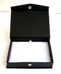 Black leather jewelry set box with white velvet inside