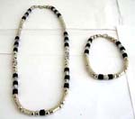 Fashion necklace set with long bali bead and black and silver beads design, matched with a bracelet