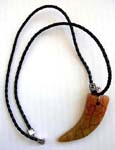 Twisted black cord necklace with genuine chinese brown  / yellow jade elephant teeth pendant