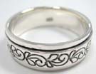 Funky vine and leaf pattern etched into thick 925. sterling silver ring