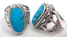 Large, oval aqua colored gem set in 925. sterling silver ring