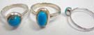 925. Sterling silver ring with aquamarine blue gemstone in an assortment of sizes picked randomly by our warehouse staff. 
