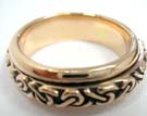 Celtic knot band in center of bronze ring