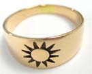 Solid bronze ring with sun engraved into front 