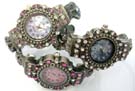 Beautiful cz crystals inlaid in frame of vintage style wrist watch with each flower on bracelet holding rhinestone. Comes in an assortment of colors picked randomly by our warehouse staff 