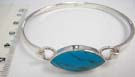 Vintage style, beautiful turquoise colored stone held by 925. sterling silver bangle bracelet