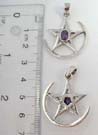 Quality 925. sterling silver charm with cz gemstone in center of star sitting on arched rod
