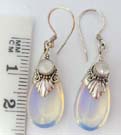 Imitation pearl designed stone inlaid in leaf decor of 925. sterling silver mounting with large rain drop shaped moon stone earrings