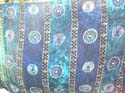 Tie dye blue wrapping sarong with shield and sun pattern 