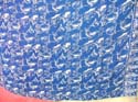 Stamped ton of dolphin on blue sarong wrap 