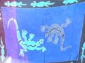 Blue sarong with couple fighting gecko