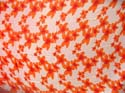 Orange daisy on white sarong wrap