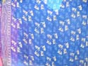 Blue sarong wrap with mini geckos
