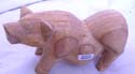 Cutie's wooden pig statue