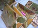 Natural handmade photo album front and back covers made from banana and other leaves decorated with tree sticks