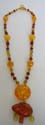 Fashion amber necklace with 2 amber holding mini amber chips at the bottom 