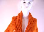 Fashionable knit crochet ladies poncho with butterfly bow in the middle