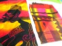 African figure on colorful balinese pareo wrap