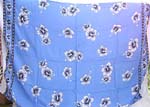 Light blue background color with star-like flower pattern and edge design