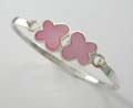 Solid sterling silver bangle with two flowers design with pink mother of pearl inlay. 
