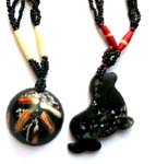 Beaded necklace with assorted genius shell pendant in different shape design