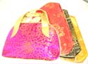 Beautiful silk handbag is decorated with traditional Chinese wealth flower pattern
